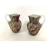 A pair of cased glass jugs, possibly Murano, with spiral body and celery stock handle (each: 15cm