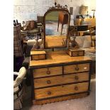 A Victorian satin birch dressing table, the hinged mirror supported by a pair of jewellery drawers