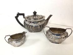 An 1894 Sheffield silver teapot with matching milk jug and two handled sugar bowl, all with makers