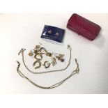 Two 9ct gold chain link necklaces (longest: 25cm) (combined: 4.41g) and an assortment of earrings