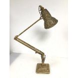 A mid 20thc anglepoise table lamp with mottled gilt finish, the shade with rolled edge to bottom, on