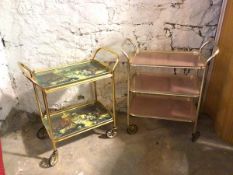 Two vintage metal hostess trolleys, one with two tiers, top tier with removeable tray, both trays