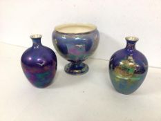 A 1920s/30s Crown Devon lustre ware, including a footed vase and two baluster vases (16cm) (3)