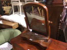 A Victorian dressing table mirror with domed top on serpentine base (damage to frame) (49cm x 46cm x