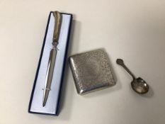 An Edwardian Birmingham silver cigarette case with foliate engraved exterior (115.73g) and a