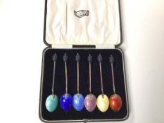 A set of six 1920s silver and enamelled coffee bean spoons in original J.A. Ramsay, Dundee box (