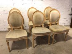 A set of six Louis XVI style side chairs, all with distressed upholstered backs and seats, some