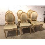 A set of six Louis XVI style side chairs, all with distressed upholstered backs and seats, some