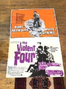 Two vintage movie posters including White Lightening starring Burt Reynolds and The Violent Four