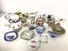 A collection of children's and doll house china, including teapots, teacups, saucers, plates, a