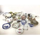 A collection of children's and doll house china, including teapots, teacups, saucers, plates, a