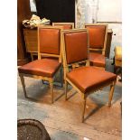 A set of four Louis XVI style side chairs with studded red leather backs and seats (91cm x 47cm x