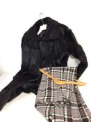 A vintage fur coat and lady's tartan style skirt with Laird-Portch label to interior (size 32 or