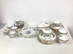 A 1930s/40s Foley bone china Ming Rose pattern part tea service with four teacups, six saucers,