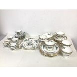 A 1930s/40s Foley bone china Ming Rose pattern part tea service with four teacups, six saucers,