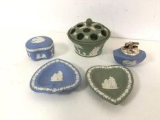 A collection of blue and green Wedgwood jasparware including spade and heart trinket dishes, table