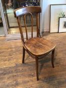 An early 20thc bistro style chair with bentwood back, stretchers and supports (92cm x 40cm x 44cm)