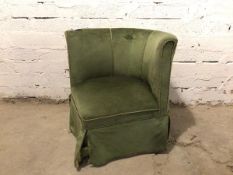 An Edwardian corner chair upholstered in olive green fabric, on four turned supports (69cm x 73cm