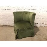 An Edwardian corner chair upholstered in olive green fabric, on four turned supports (69cm x 73cm