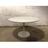 A contemporary Tulip style white laminated dining table, attributed to Eero Saarinen for Knoll