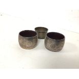 A pair of Birmingham silver napkin rings, both inscribed 25 to front and another Birmingham silver