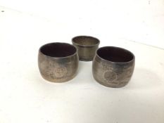 A pair of Birmingham silver napkin rings, both inscribed 25 to front and another Birmingham silver