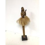 A Hawaiian figure of a Lady playing a Eukele (52cm)