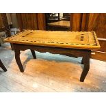 A modern coffee table with parquetry top above a moulded apron, on cabriole legs, inscribed W Baron,