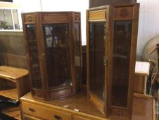 A pair of Chinese hanging display corner cabinets, with bevelled glass door flanked by two glass