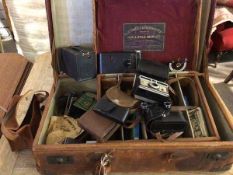 A collection of vintage cameras including a Kodak Instamatic 204, a no.2 folding autographic