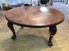 A 19thc dining table, the moulded top on cabriole supports with acanthus leaf knees and ball and