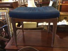 A modern footstool with blue upholstered top (42cm x 50cm x 40cm)