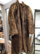 A vintage fur coat, bearing Marcus, London, Edinburgh and Newcastle label to interior (33cm x