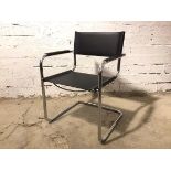 A Bauhaus style cantilever chair with black leather sling back and seat, stamped Made in Italy to