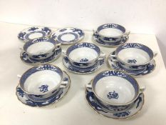 A set of six Booths dragon pattern soup bowls with handles to side, with matching saucers and two