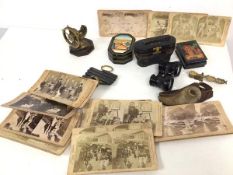 A mixed lot including stereoscopic cards, opera glasses, novelty nutcrack in the form of a Ship's