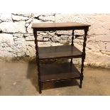 A 1930s/40s oak occasional table with two lower tiers on barley twist supports with beading to edges