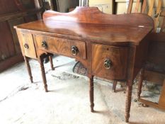 A Welsh, probably Anglesey, c. 1830 mahogany sideboard with moulded ledge back above a frieze drawer