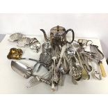 An assortment of Epns including teapot (17cm x 23cm x 11cm) and coasters, ladles, knives, forks,