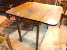 A Victorian mahogany drop leaf table with two dummy drawers on straight square tapering supports (