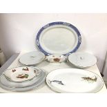 A mixed lot of serving dishes, including ashet (47cm x 27cm), two German Thomas brand serving dishes