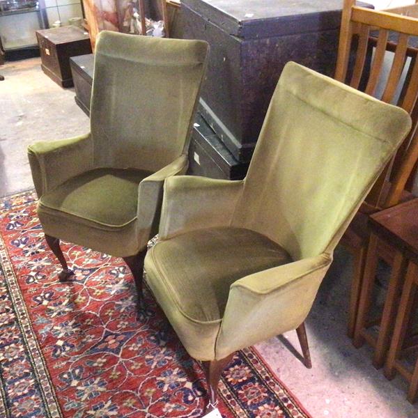 A pair of 1940s/50s armchairs, with later upholstery on cabriole front supports terminating in pad