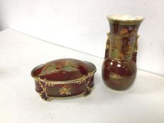 A 1930s/40s Crown Devon vase of bottle form with flared rim and Chinese inspired decoration (