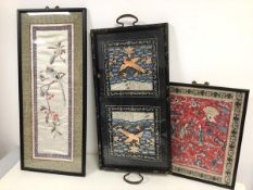 A pair of 1920s Chinese silk panels under glass in ebonised and floral decorated two handled tray (