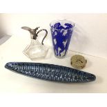 A mixed lot including a glass metal mounted claret jug, stone coasters with birds, hors d'oeuvre