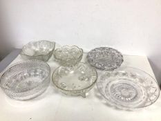 An assortment of six cut glass bowls of various shapes and designs (largest: 9.5cm x 23cm)