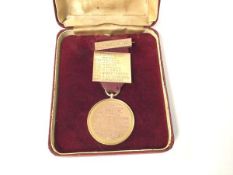 A 9ct gold medal inscribed Presented by D.M. Stocks listing winners from 1962 onwards with
