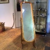 A modern pine cheval mirror on trestle base