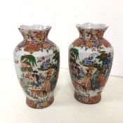 A pair of mid to late 20thc Chinese vases, both of baluster form with scalloped flared rims,