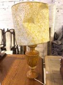 A Victorian ceramic style table lamp with mustard yellow glaze and foliate design (85cm to top of
